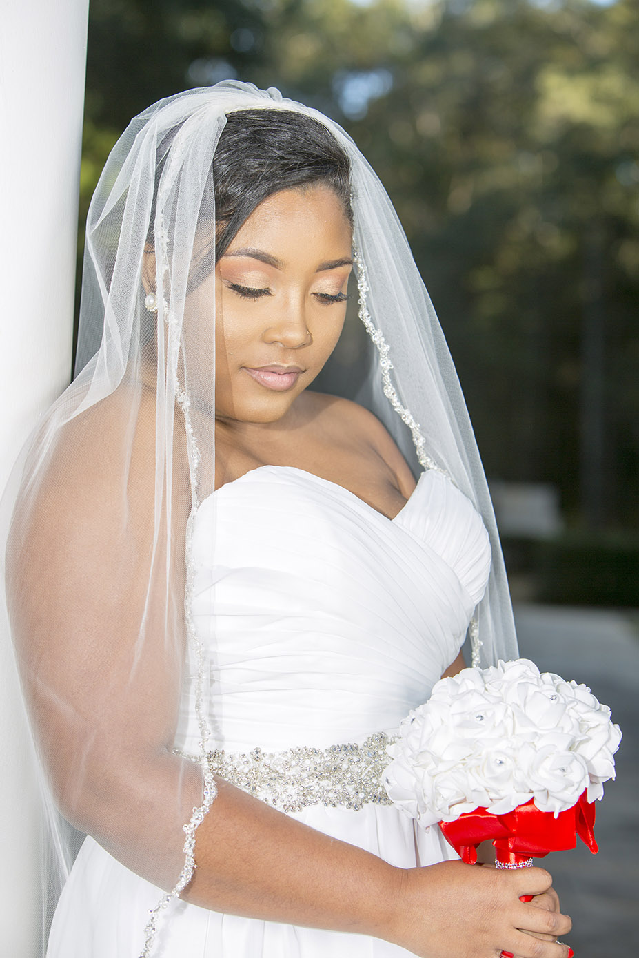 bride posing in white wedding dress